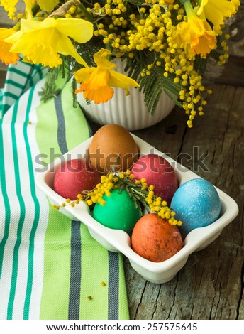 Easter time, spring flowers, easter eggs and easter bunny