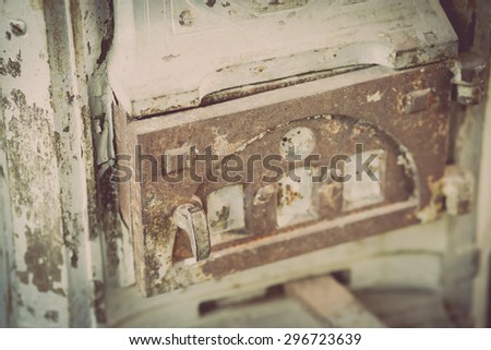 Color picture of a vintage iron stove door