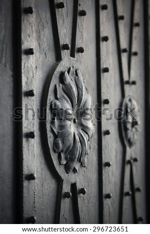 Color picture of an old iron door detail