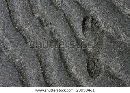 single foot print in sand