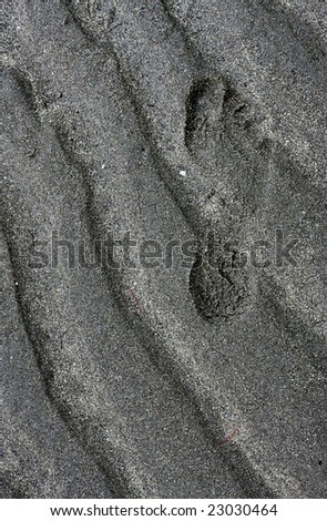 single foot print in sand