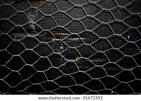 stock-photo-grunge-chicken-wire-fence-texture-35672392.jpg