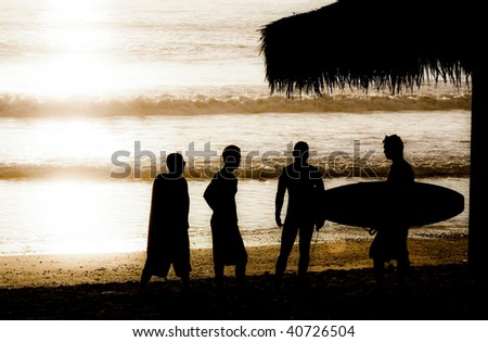 surfer and friends silhouette