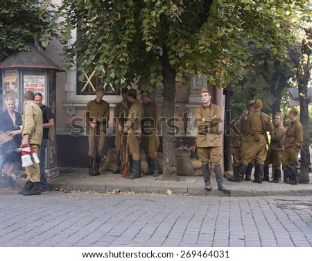 CHERNIVTSI, UKRAINE - AUG 29, 2014: People working during shooting  the film \