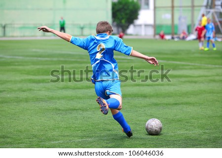 BELGOROD, RUSSIA - JUNE 17: Unidentified boy from football team \