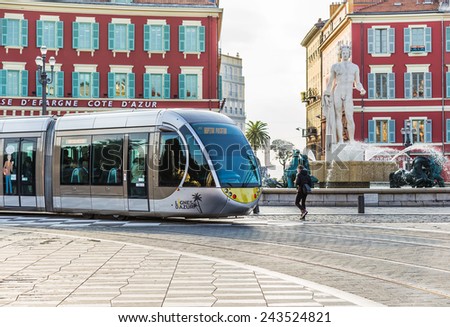 NICE, FRANCE - NOVEMBER 5, 2014: Modern tram in the centre of city. Tram is the main mode of transport in the city. The tram line connects the western and eastern parts of the city.