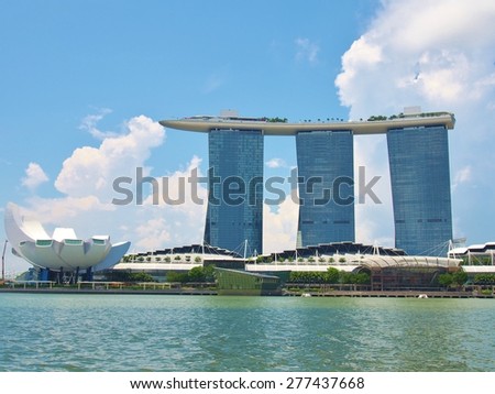 SINGAPORE - MAY 9: Day view of Singapore Marina Bay Sand on May 9, 2015 in Singapore. Marina Bay Sands is billed as the world\'s most expensive standalone casino.