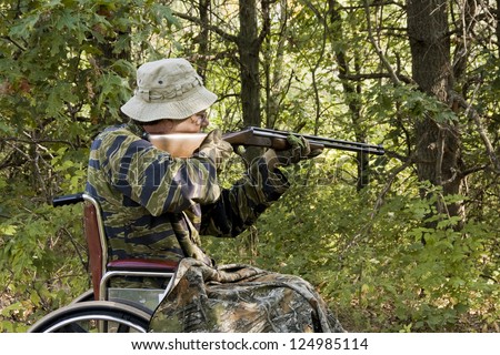 disabled man hunting small game from a wheelchair