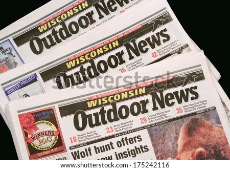 RIVER FALLS,WISCONSIN-FEBRUARY 05,2014: Several issues of Wisconsin Outdoor News. Outdoor News is published by-weekly by Outdoor News Inc. of Plymouth,Minnesota.