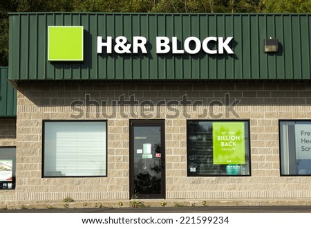 RIVER FALLS,WISCONSIN-OCTOBER 05,2014: An H&R Block storefront. H&R Block is a tax return preparation company with offices in the United States,Canada,Australia,Brazil and India.