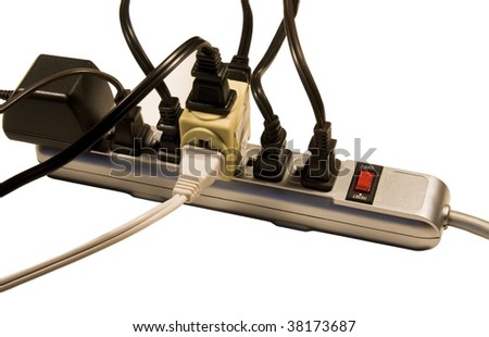 Numerous Cords And Transformer Plugged Into A Power Strip Stock Photo 