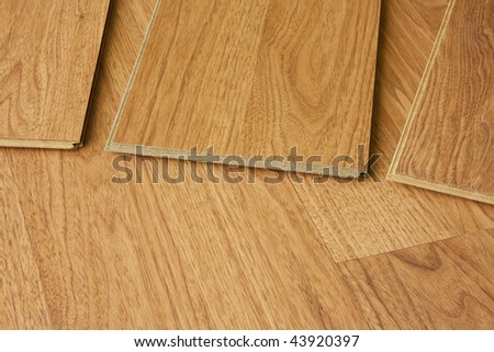 pieces of hardwood flooring showing tongue and groove