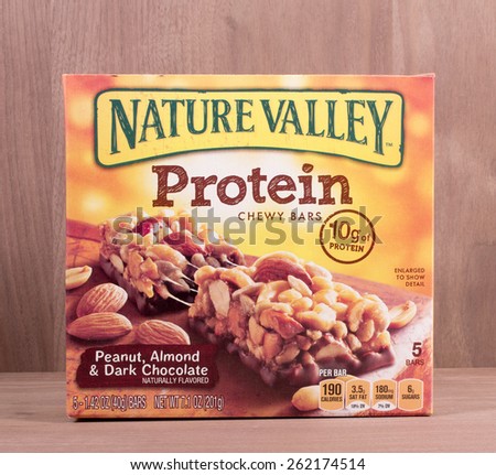 RIVER FALLS,WISCONSIN-MARCH 19,2015: A box of Nature Valley chewy protein bars. Nature Valley products are a brand  owned by General Mills Incorporated.