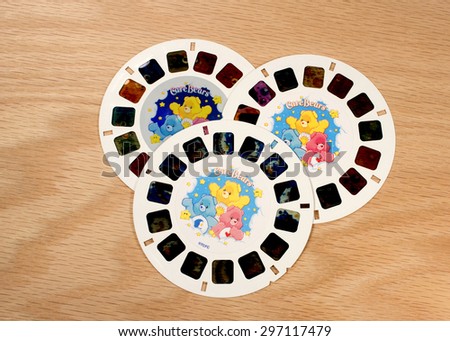 RIVER FALLS,WISCONSIN-JULY 16,2015: A group of Care Bears View-Master disks. The Care Bears were created by American Greetings Corporation in Nineteen Eighty One.