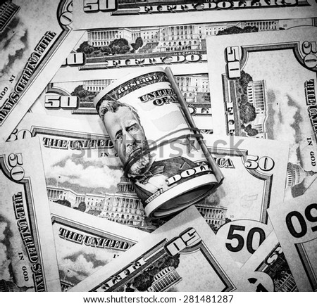 Success and got profit from business with all fifty us dollars banknotes on black and white color