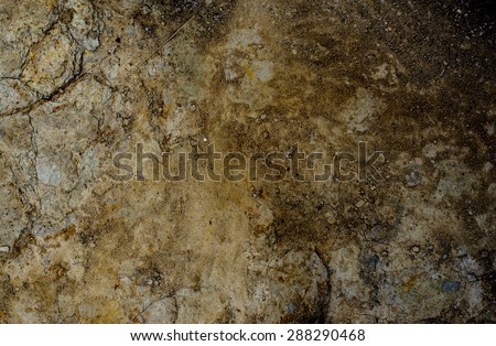 Abstract of dry ground with brown color lighting on left and darken on right