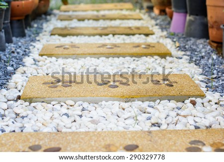 Background and texture with small stone of walkway pads in the garden,Focus on second pads