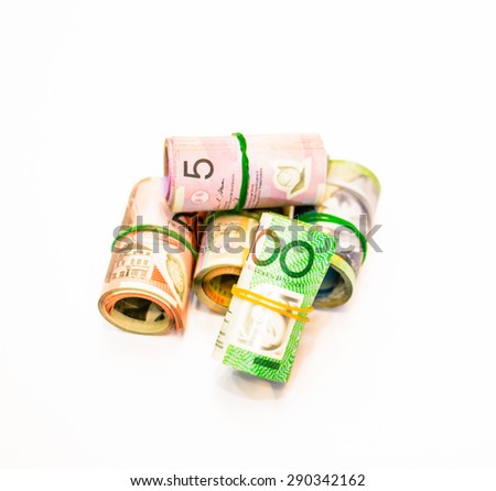 Colorful of Australian Dollars roll with all denomination on white background,Focus on five dollar notes