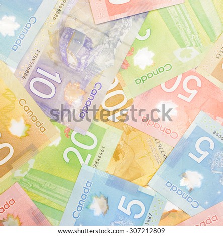 Colorful background and texture of Canadian dollars banknotes