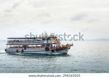 KOH LAN, PATTAYA, THAILAND - NOVEMBER 23, 2013 ; Tourists are taking a rest on Ferry boat on November23, 2013 in Koh Larn Island .The Ferry boat will be served every day from morning to evening.