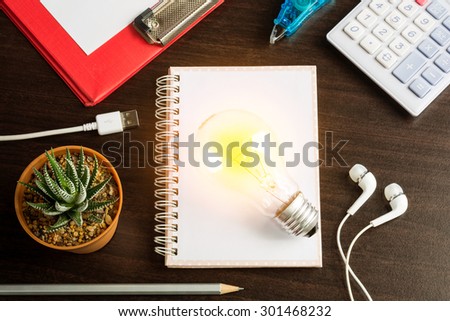 Note book paper empty with pencil and lamp with haworthia fasciata(Willd.) on wood table - Creativity crisis concept