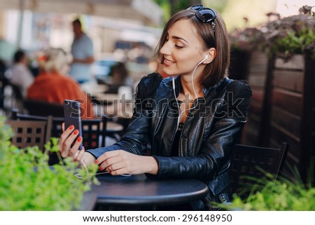 beautiful girl enjoys gadgets