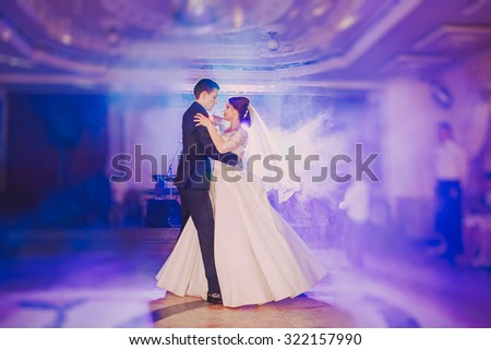 romantic couple dancing on their wedding