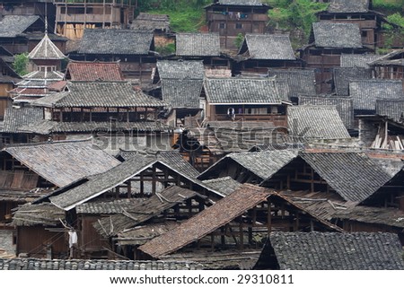 China\'s ethnic minorities living in Guizhou house.