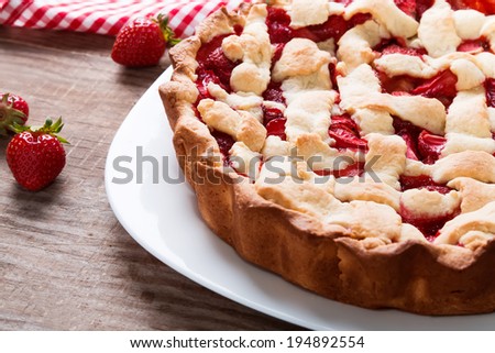 Homemade rhubarb and strawberry cake on the table