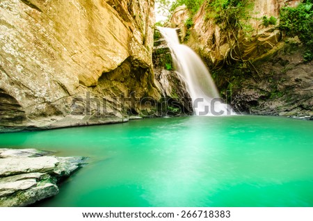 Chattrakan Waterfall in Thailand water fall in deep forest at border of Phitsanulok province Thailand : soft focus