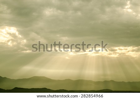 light of god in to mountain with best sky and cloud