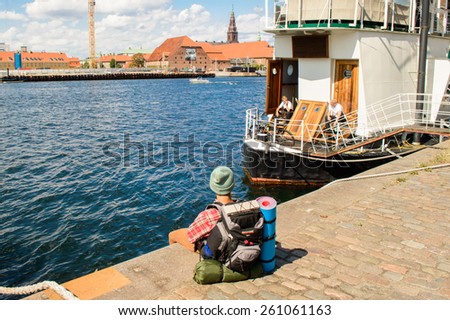 COPENHAGEN, DENMARK - AUGUST 12: Lonely traveler on August 12, 2014 in Copenhagen.