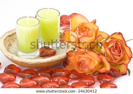 tea roses, candles and glass hearts