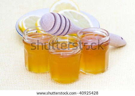 honey, lemon and wooden drizzler