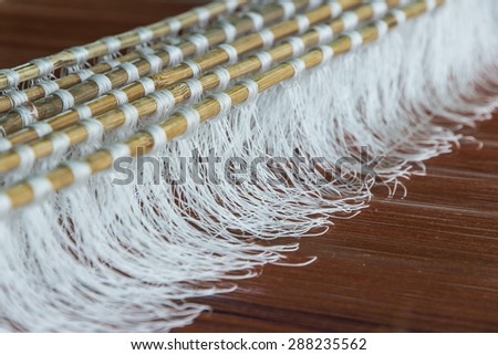 Silk weaving arts and crafts or craft is one that has existed since ancient times. Method of producing a cloth using up yarn and yarn scrub together as a fabric.