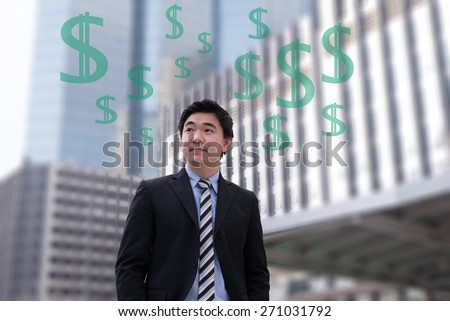 Raining money on a celebrating businessman