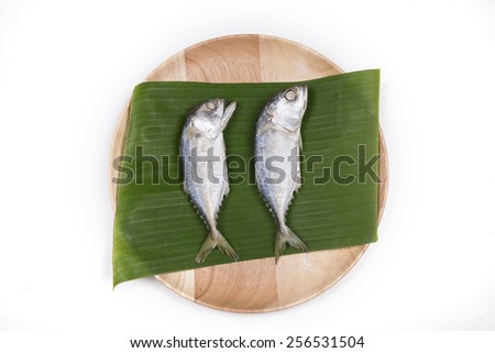 mackerel fish on banana leaf