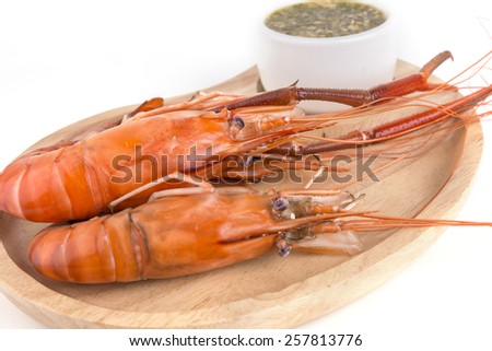Thai food menu, steam prawns with a spicy seafood sauce on isolated white background