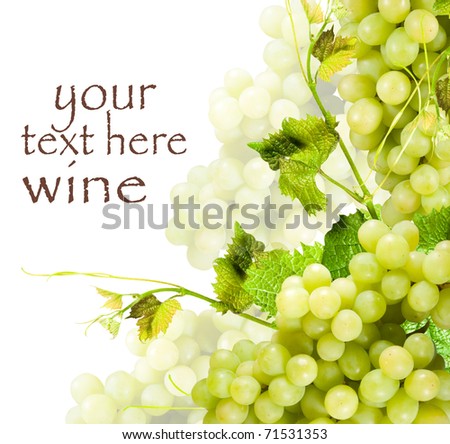 green grape and leafs on white background