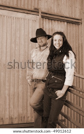 Sepia shot of a young country farming couple