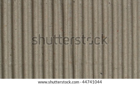 Brown corrugated cardboard sheet useful as a background (16:9 aspect ratio)