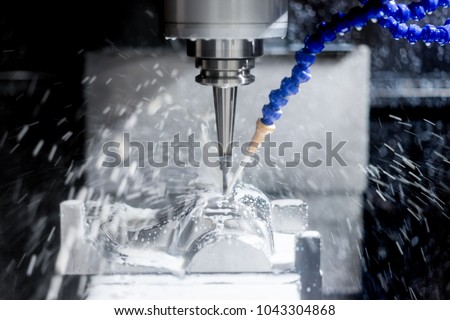 High precision CNC machining center working, operator machining automotive sample part process in factory