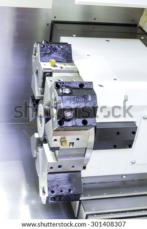 Rotating head in a high precision mechanics plant at CNC lathe