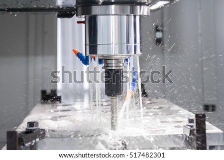 High precision CNC machining center working, operator machining die metal mold process in factory