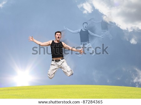A boy jumping with excitement in the air
