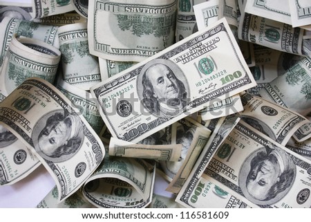 Hundred dollar bills money pile