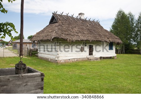 A typical ukrainian peasant house, a khata, in an open-air museum of wooden architecture in Budy village, eastern Poland.