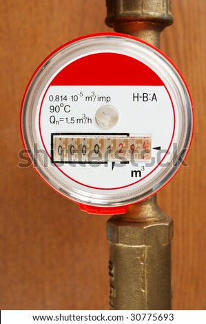 meter and tubes   on the brown background