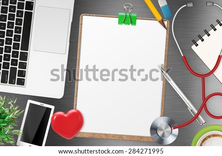 messy doctor office desk with blank clipboard