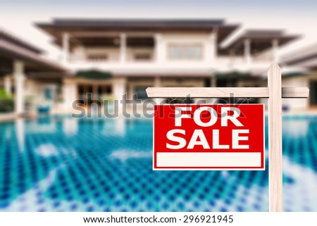for sale sign at luxury house with pool background